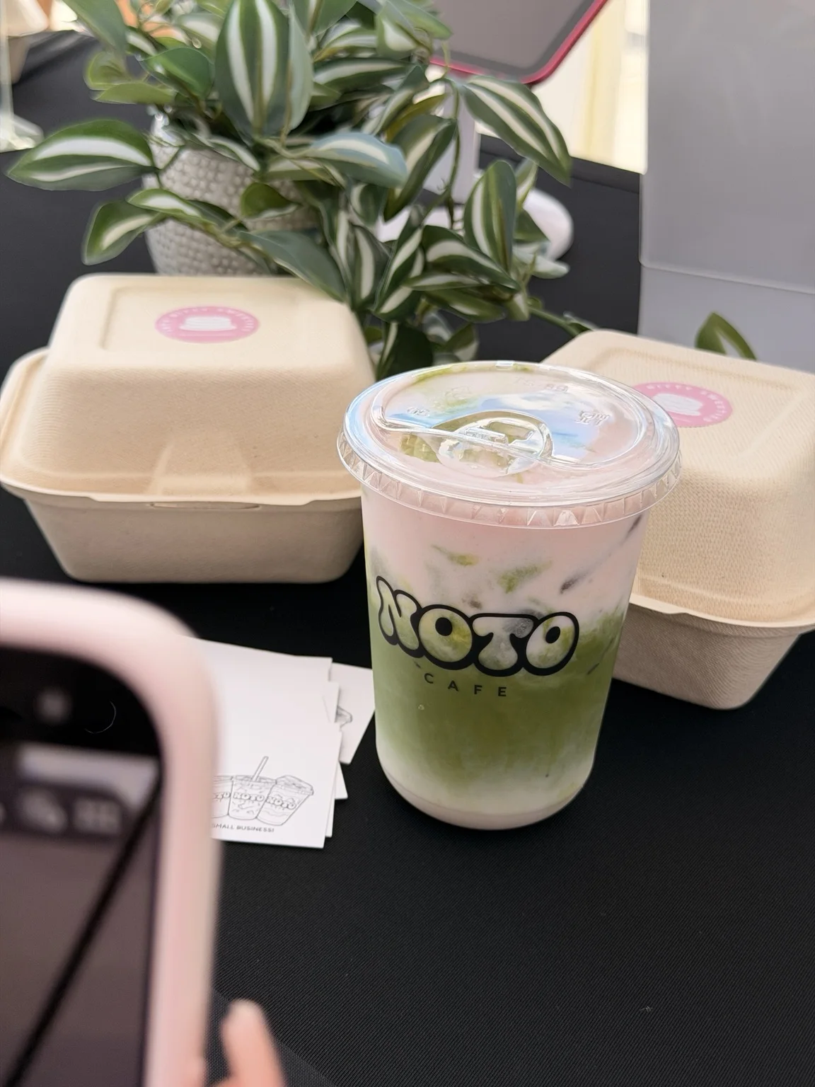 Berry Me strawberry matcha with pink foam in a branded NOTO cup